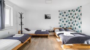 Posteľ alebo postele v izbe v ubytovaní Sunny - BillBerry Apartments