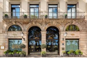 
a large building with a large window at Duquesa de Cardona 4* Sup in Barcelona
