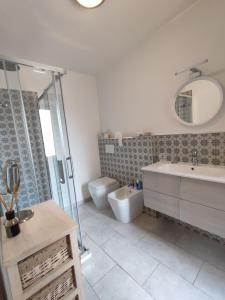 Koupelna v ubytování Il grazioso appartamento di Chiara con posto auto privato + 19 fotografií