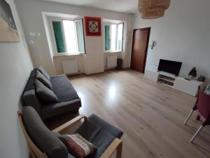 Posezení v ubytování Il grazioso appartamento di Chiara con posto auto privato