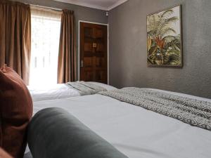 Postel nebo postele na pokoji v ubytování 16 Vaalrivier