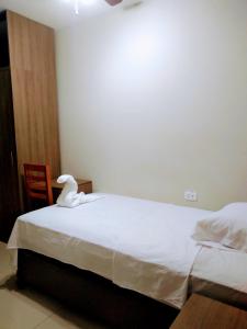 Postel nebo postele na pokoji v ubytování Hospedaje bolognesi