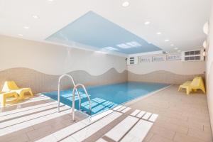 Der Swimmingpool an oder in der Nähe von Dünenschloss Wohnung 4-03