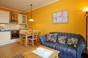 O bucătărie sau chicinetă la Dünenschloss Wohnung 1-34