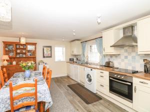 Köök või kööginurk majutusasutuses Badger Cottage