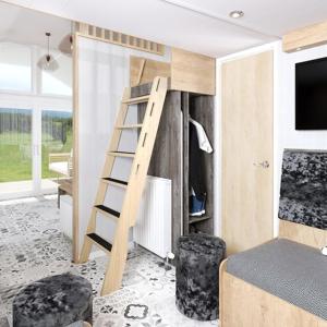 um quarto com um beliche com uma escada em The Parr Pod - Beautiful, luxury pod em Aberlour