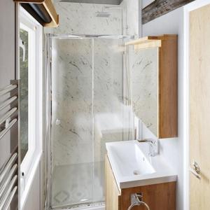 a bathroom with a shower and a sink at The Smolt Pod - Beautiful, luxury pod in Aberlour