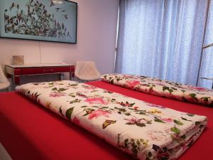 Posteľ alebo postele v izbe v ubytovaní Ambiente