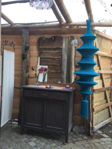 a blue vase sitting on top of a table at Gîtanneke in Burg-Reuland