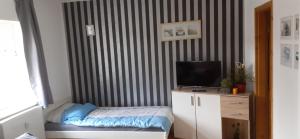 Postel nebo postele na pokoji v ubytování Monteurswohnungen in Kirchhain zentral