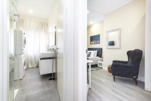 TV a/nebo společenská místnost v ubytování Exclusive Room Arena Inalpi 'La casa di Bertino'