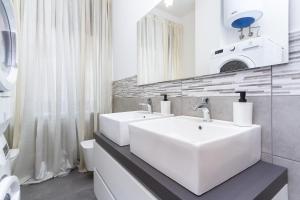 Koupelna v ubytování Exclusive Room Arena Inalpi 'La casa di Bertino'