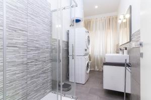 Koupelna v ubytování Exclusive Room Arena Inalpi 'La casa di Bertino'
