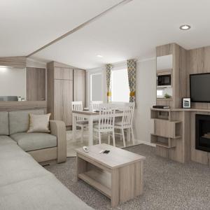 The Dram Van - Beautiful, luxury static caravan في أبرلور: غرفة معيشة مع أريكة وغرفة طعام