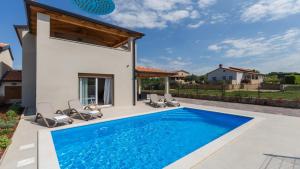 Bazén v ubytování Villa Alcove with breathtaking Sea View and Private Pool nebo v jeho okolí