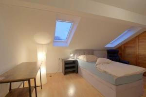 Cama ou camas em um quarto em Gästehaus Midlum