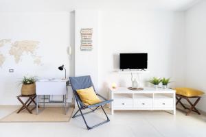 TV a/nebo společenská místnost v ubytování Home2Book Charming Apartment in Bajamar