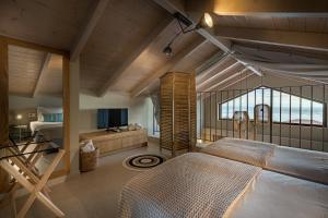Postel nebo postele na pokoji v ubytování Terra Lucis Mountain Residences