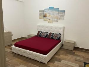 Postel nebo postele na pokoji v ubytování La Terrazza di Rovaglioso