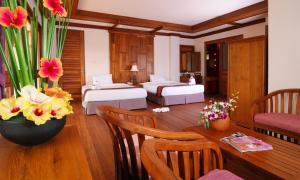 Postel nebo postele na pokoji v ubytování Andamania Beach Resort, Khaolak - SHA plus + 27 fotografií