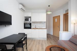 Kuchyň nebo kuchyňský kout v ubytování Apartments Jakoplić