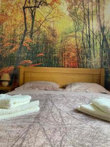 Ein Bett oder Betten in einem Zimmer der Unterkunft Holiday Homes Durmitorski Gaj