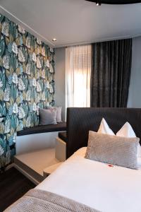 Relais sul Mare Boutique Hotel客房内的一张或多张床位