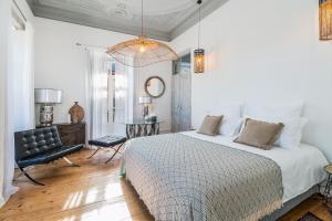 Łóżko lub łóżka w pokoju w obiekcie La Maison Bleue Algarve