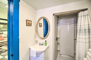 a bathroom with a sink and a shower at Unique ATV Apartment in Remodeled Schoolhouse in Gary +36 photos