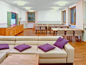 A seating area at Holiday Home Runnimoos-3 by Interhome