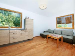 A seating area at Holiday Home Runnimoos-3 by Interhome