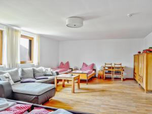 A seating area at Holiday Home Runnimoos-3 by Interhome