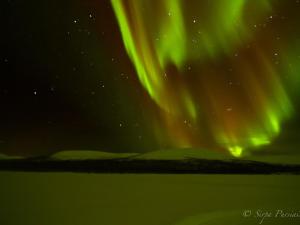 an image of the northern lights in the sky at Holiday Home Saivontupa by Interhome in Ylikyro