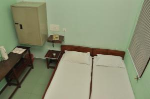 Postel nebo postele na pokoji v ubytování VALLI HOTEL