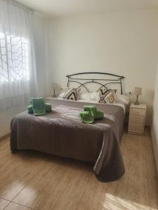 Postel nebo postele na pokoji v ubytování Apartaments Flamingo