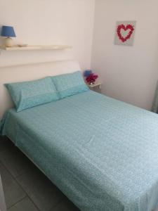 Posteľ alebo postele v izbe v ubytovaní Casa di Silvia