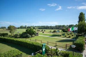 Zahrada ubytování Cosmopolitan Golf & Beach Resort