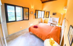 A bed or beds in a room at Scopello Home