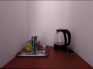 Příslušenství pro přípravu čaje a kávy v ubytování Sant' Elena Room