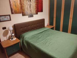 Postel nebo postele na pokoji v ubytování Scorcio sul Mare