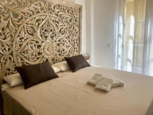 Łóżko lub łóżka w pokoju w obiekcie Apartamentos El Mar Azul 5 El Bajondillo Torremolinos