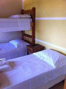 Divstāvu gulta vai divstāvu gultas numurā naktsmītnē Pousada Vista Alegre