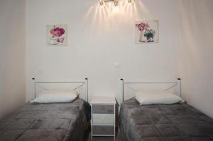 Postel nebo postele na pokoji v ubytování Efi Apartments + 37 fotografií
