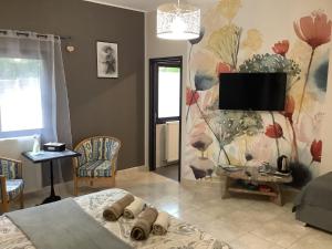 TV a/nebo společenská místnost v ubytování Rêv'de Thau