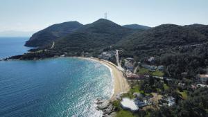 an aerial view of a beach next to the water at Nenas House in Iraklitsa