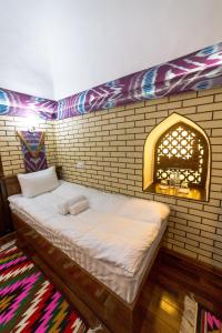 Φωτογραφία από το άλμπουμ του Feruzkhan Hotel - Madrassah Mohammed Rakhim Khan 1871 στη Χίβα