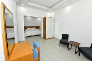 Ένα ή περισσότερα κρεβάτια σε δωμάτιο στο Summit Hotel Suites - القمة للأجنحة الفندقيه