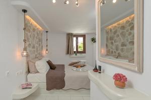 Posteľ alebo postele v izbe v ubytovaní Geolenas Home - Naxian Old Agora
