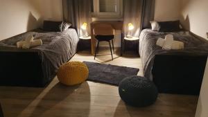 Säng eller sängar i ett rum på Vela Grota