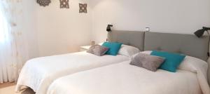 מיטה או מיטות בחדר ב-El Mirador 2
